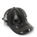 black ripped jeans baseball cap